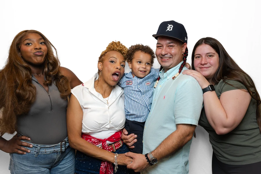 Family of five on a white backdrop
