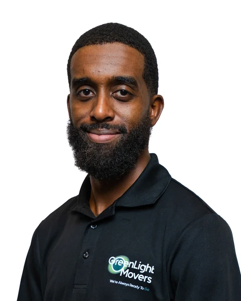 Professional headshot at the Clark Insurance office opening, Magnolia, TX: man with a beard in a black polo